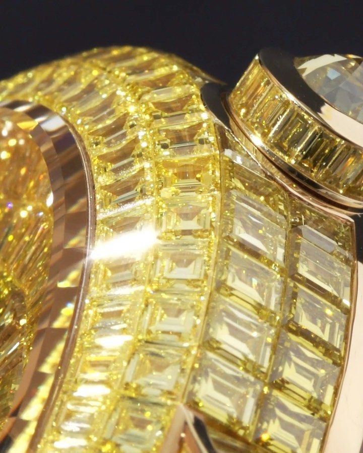 Baguette stones following the curve of a watch case.